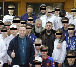 Ukrainian children pictured with their Russian abductors