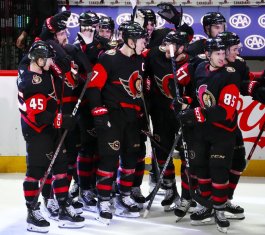 Ottawa Senators crowd around Brady Tkachuk (7) after his overtime goal against the Pittsburgh Penguins in an NHL hockey game Wednesday, Jan. 18, 2023, in Ottawa, Ontario. (Sean Kilpatrick/The Canadian Press via AP)(Sean Kilpatrick / Associated Press)