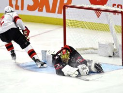 Ottawa Senators goalie Joonas Korpisalo stretches to make a save vs. NJ Devils, Dec. 29, 2023 