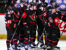 Ottawa Senators crowd around Brady Tkachuk (7) after his overtime goal against the Pittsburgh Penguins in an NHL hockey game Wednesday, Jan. 18, 2023, in Ottawa, Ontario. (Sean Kilpatrick/The Canadian Press via AP)(Sean Kilpatrick / Associated Press)