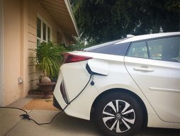 EV plugged into a home electrical outlet